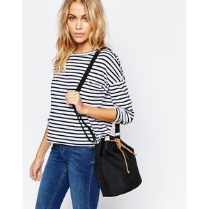 HERSCHEL SUPPLY CO DRAWSTRING BUCKET CROSSBODY BAG